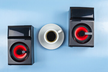 Column, headphones, smartphone and a cup of coffee.