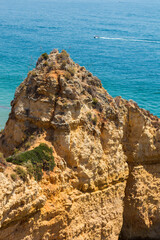 Algarve, Lisbon. Beautiful bay near Lagos town with high cliffs on the shore of the Atlantic Ocean. The Algarve is the southernmost region of continental Portugal. 