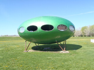 Green alien flying saucer 