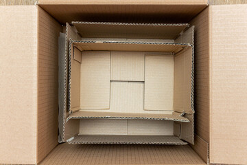 Carton, cardboard packages inside a paper box