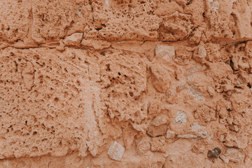 Stone wall texture/background,historical old ancient stone,preserved to our time, stones are laid evenly, solid construction has been standing for many centuries,ancient buildings,buildings and ruins