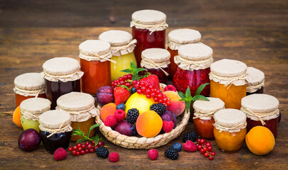 Various homemade fruit jam in the jars 