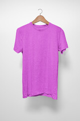 Purple T-Shirt on a hanger against a white background