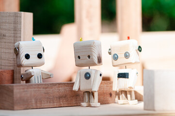 DIY wooden toy of the robot. ecology technology concept. recycled materials.