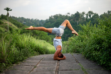 Fototapeta premium Man practice Yoga practice and meditation outdoor