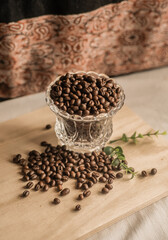Coffee beans in a glass cup