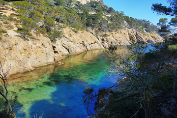 Fototapeta na wymiar Sea channel near mediterranean village of Tossa de Mar, Catalonia, Spain