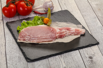 Raw pork bacon