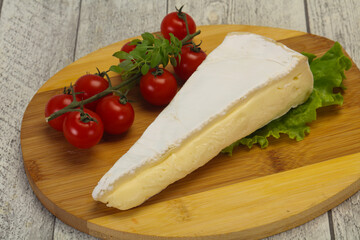 Brie cheese triangle served salad