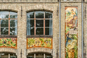 Fototapeta na wymiar School of Decorative Arts, panel of tiles in Art Nouveau style in Strasbourg