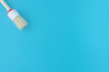 brush for painting on a blue background. Repair