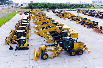 heavy construction equipment store. excavator, bulldozer, grader, front loader. Aerial view