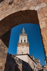 Tower of the Burgo de Osma Cathedral through the San Miguel door, Soria, Spain