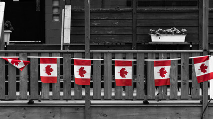 Red Canada Flags at the Royal Canadian Legion in Canmore Selective Color Wallpaper