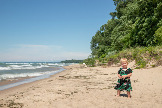 Little girl standing on the beach at Indian Dunes National Park posing for a picture