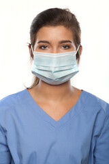 Young Woman Wearing Medical Scrubs and a Surgical Mask