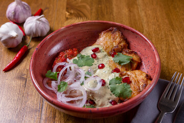 Baked chicken served with different sauces