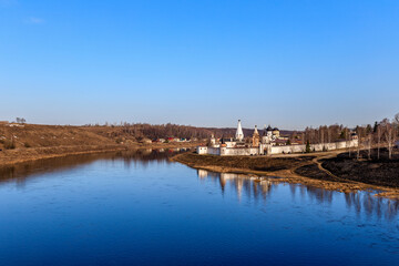 The Volga River flows past the Staritsky Holy Assumption Monastery. Town Staritsa. Russia.