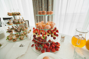 Delicacies, appetizers, wine, desserts at the Banquet. Buffet, catering service. On-site restaurant