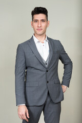 Fototapeta premium Portrait of young multi ethnic businessman in suit