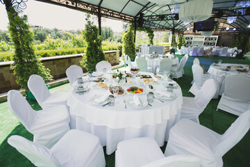 Beautifully decorated tables for guests with decorations