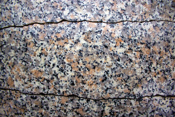 Cracked polished granite surface. Beautiful background. Concept.