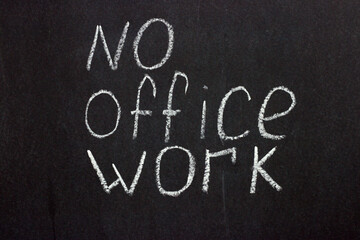 
Text on a dark board "no office work". A common phrase during the COVID 19 pandemic