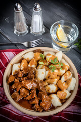 Beef stew with potatoes dumplings.
