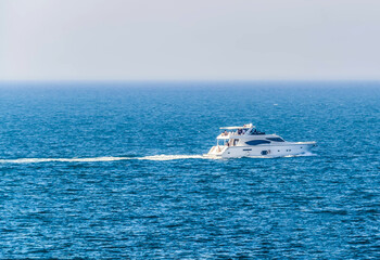 Fototapeta na wymiar Luxury Yacht Boat Speeding in Arabian Sea