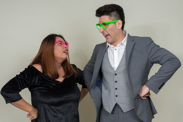 Portrait of overweight Asian businesswoman and young businessman as couple together