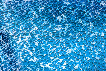 pattern of cracked classic blue glass texture