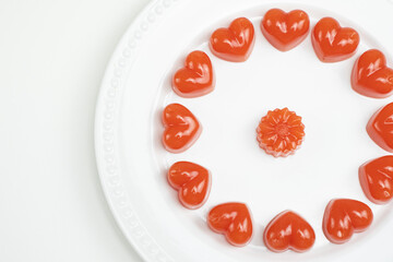 Homemade watermelon jelly or agar agar in heart and flower shapes