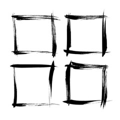 Frames from black long strokes of dry paint isolated on white background