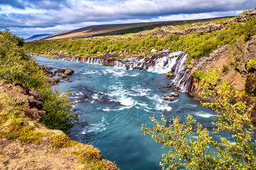 Hraunfossar Waterfalls in summer time, Iceland