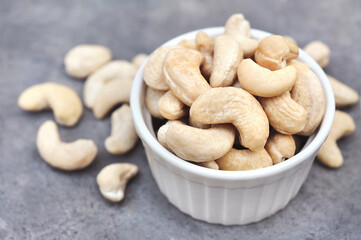 Bowl of cashew, snack food, vegan protein nuts for healthy vegetarian diet, selective focus