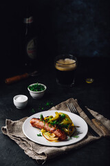 Pork sausage baked with green bell peppers, onion and herbs