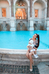 young woman relaxing by the pool