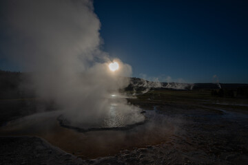 A geyser at sunrise in Yellowstone National Park, Wyoming