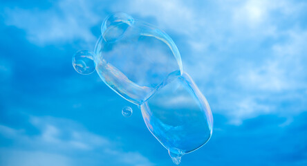 Soap bubble of several bubbles like a teddy bear animal