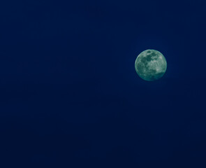 Full moon during blue hour
