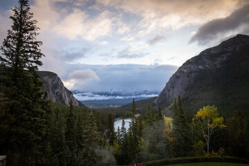 Bow River View from Fairmont Hotel Banff with misty evening clouds