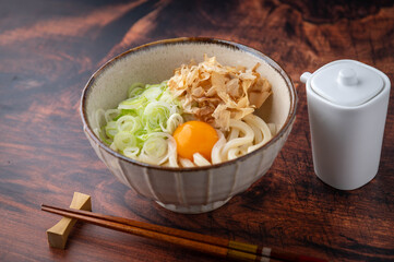 cold japanese udon noodles with raw egg yolk