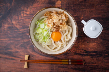 cold japanese udon noodles with raw egg yolk