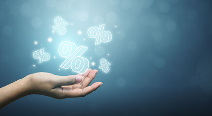 Interest rate financial and mortgage rates concept. Hand showing icon percent 3d sign symbol