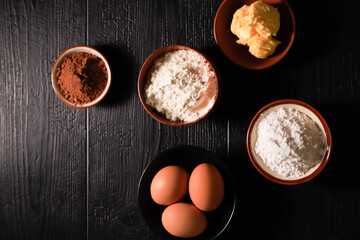 Preparing Baking. Five Bowl with Flour, Chocolate, Butter, Sugar, And Eggs.