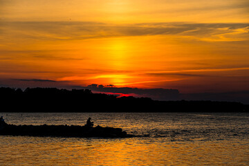 Fishing at Sunset on the River