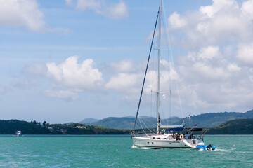 Yacht sailing under power in Phang Nga Bay