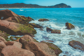 Waves, beach and rocks