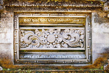 Stone frieze outside a Balinese Hindu village temple