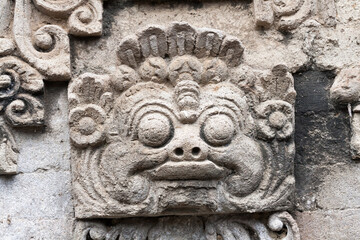 Stone carving outside a Balinese Hindu village temple